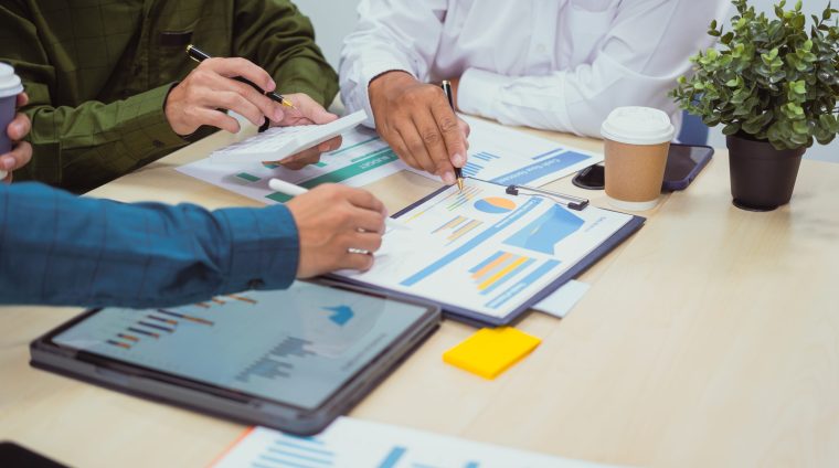 Close-up of a businessman in a meeting at the office discussing Close-up of a businessman in meeting office discussing topics related digital marketing management